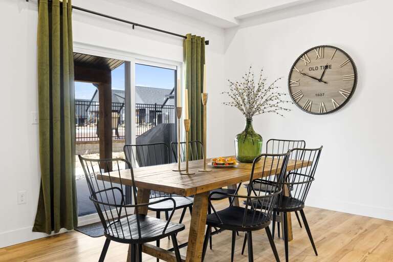 Dining Area In Vacation Rental With Sliding Door To Patio