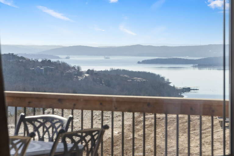 Lake View From Balcony With Chairs