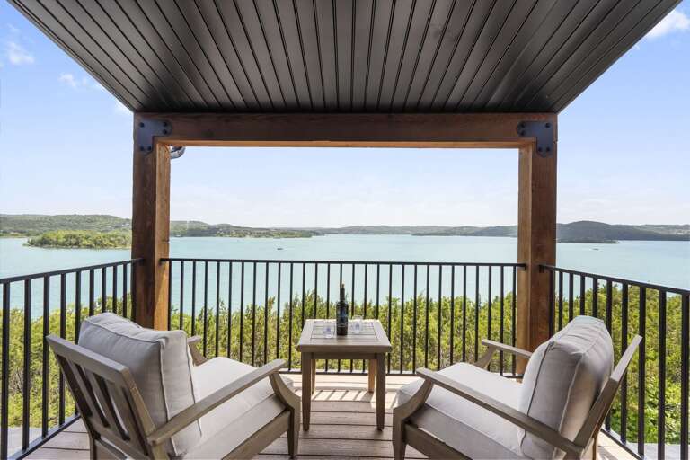 Lake View From Covered Patio With Chairs And Table