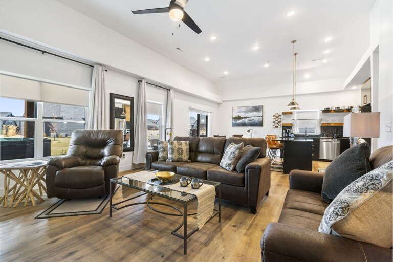 Interior Living Space With Furniture And Open-plan Kitchen