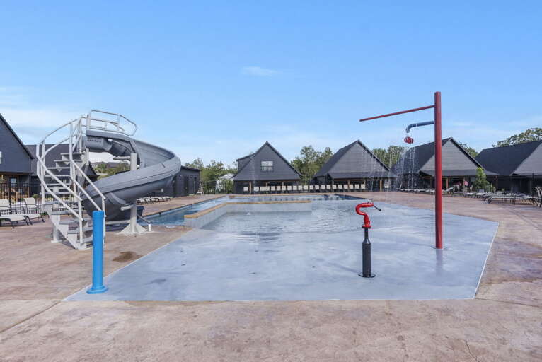Outdoor Swimming Pool With Slide And Basketball Hoop