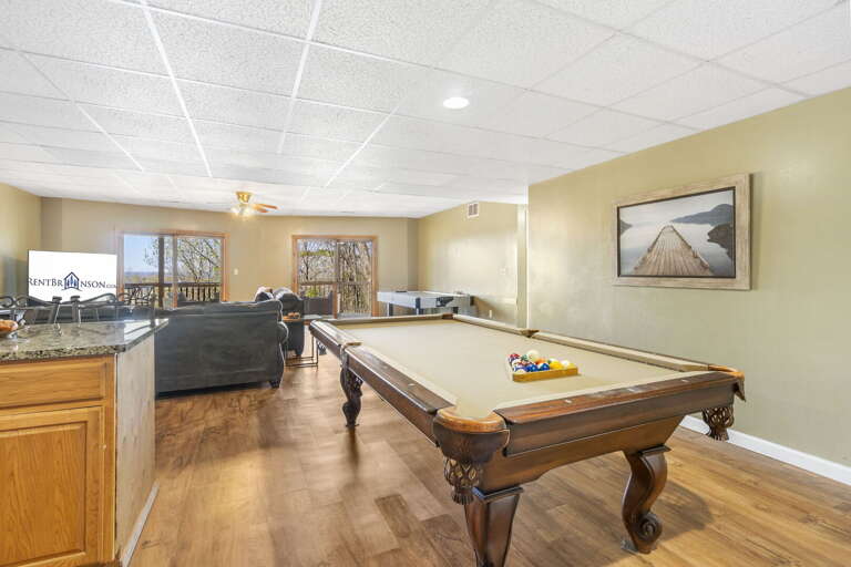 Interior With Pool Table And Seating Area