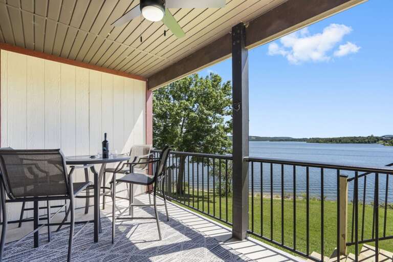 Lake View Balcony With Table And Chairs