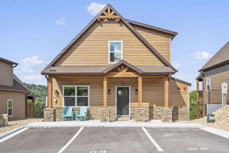 Brown Two-story Building With Parking Lot In Front
