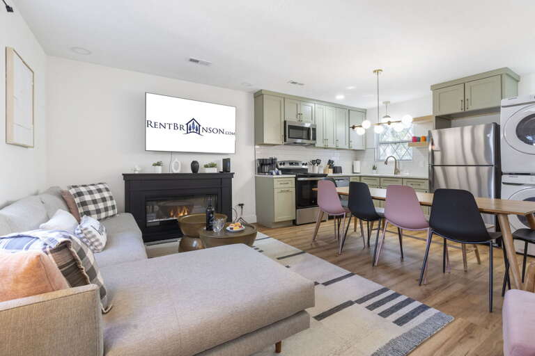 Spacious Living Space Leading Into Bright Kitchen Area, Vacation Rental Vibe Visible