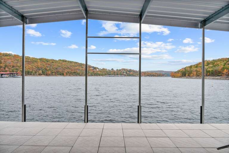 Lake View With Leafy Hills And Tiled Terrace