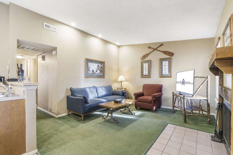 Spacious Suite Showing Seating Area, Kitchenette, And Study Space