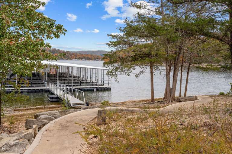Vacation Rental Vista: Tranquil Trees By Peaceful Pier And Pristine Lake