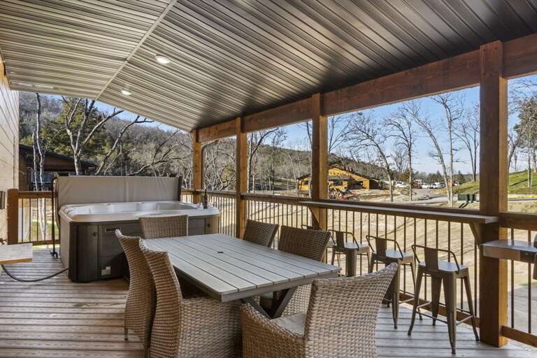 Shaded Deck With Dining Set And Hot Tub Overlooking Serene Landscape Shaded Deck With Dining Set And Hot Tub Overlooking Serene Landscape