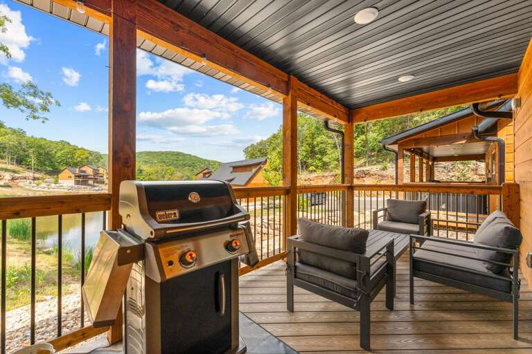 Lakeside Leisure, Lush Landscape Visible From A Vibrant Vacation Rental Veranda