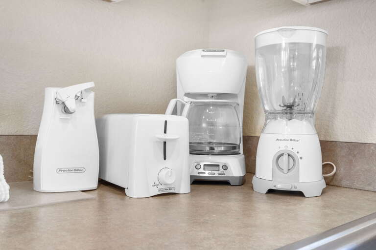 Kitchen Counter With Kettle, Toaster, And Blender