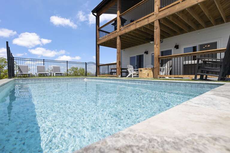 Poolside Perspective At A Spacious Vacation Rental