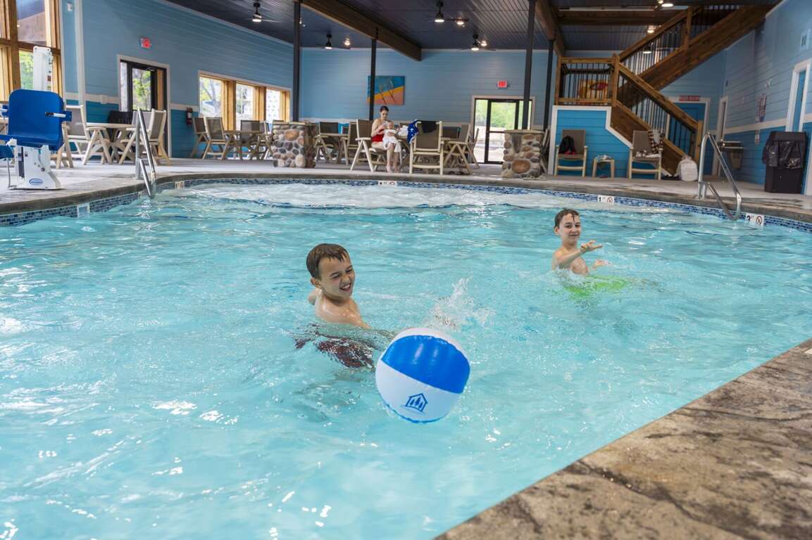 Indoor Pool Play, Children With Beach Ball, Wooden Railing