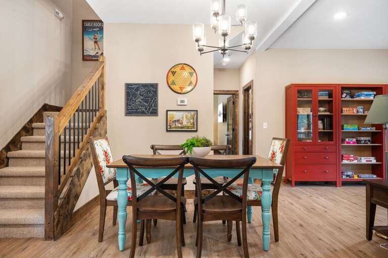 Stylish Space Showing Stairs, Seating, And Shelves