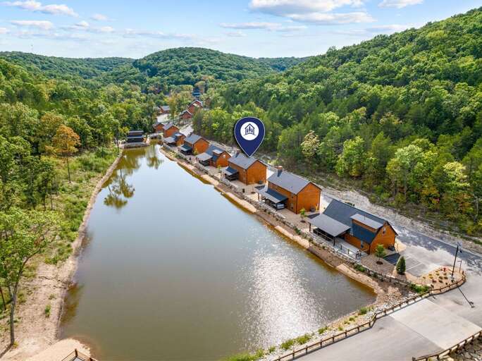 Lakeside Lodges Lined Neatly, Nestled In Nature