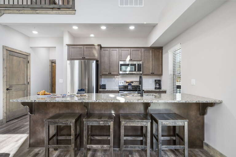 Spacious Kitchen With Bar Seating In Vacation Rental Spacious Kitchen With Bar Seating In Vacation Rental