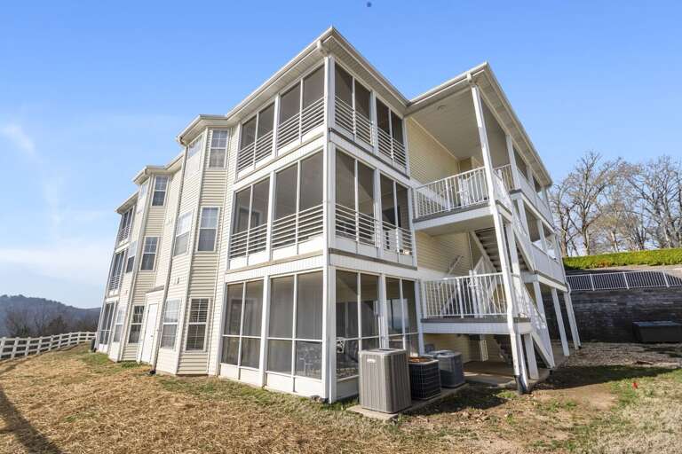 Vacation Rental Building, Balconied Structure Under Blue Sky