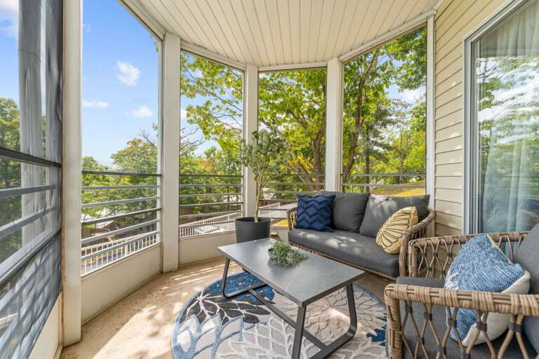 Balcony With Bench, Blue Cushions, Bright Sunny Setting
