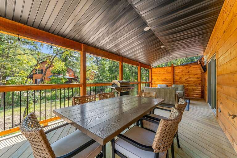Wood-paneled Patio With Table, Chairs, Under Shelter, Forest View