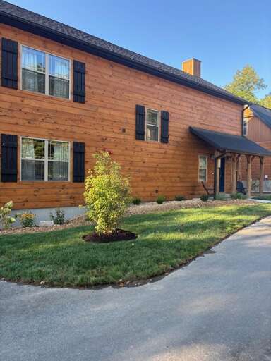 Brick Building Bathed In Blue Sky