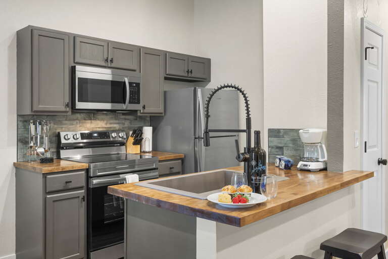 Stylish Steel Kitchen With Striking Surfaces