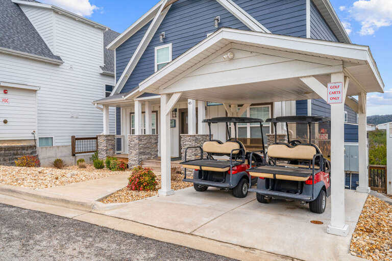 Dual Golf Carts Under A Sheltered Carport