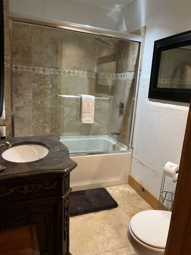 Queen bedroom ensuite bath with shower and tub