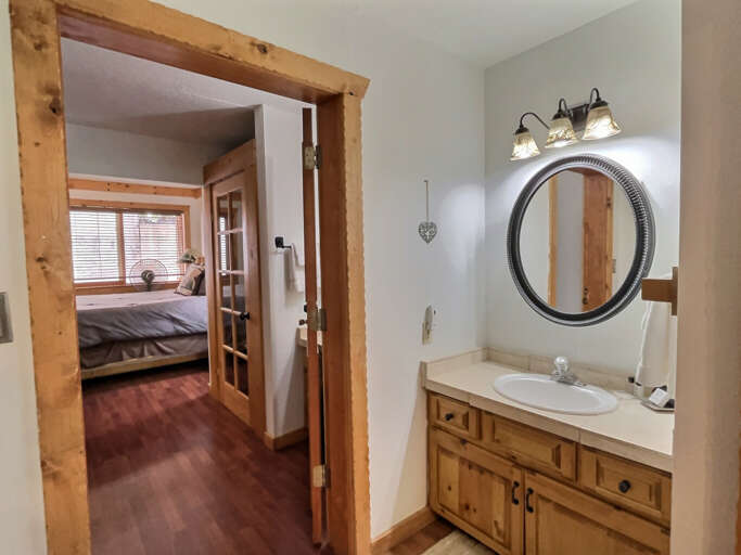Bathroom looking into bedroom
