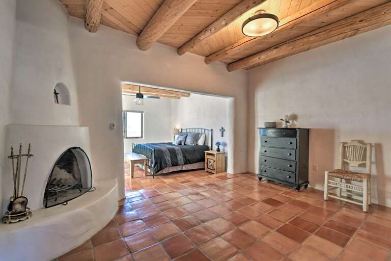 There are 3 kiva fireplaces in the home