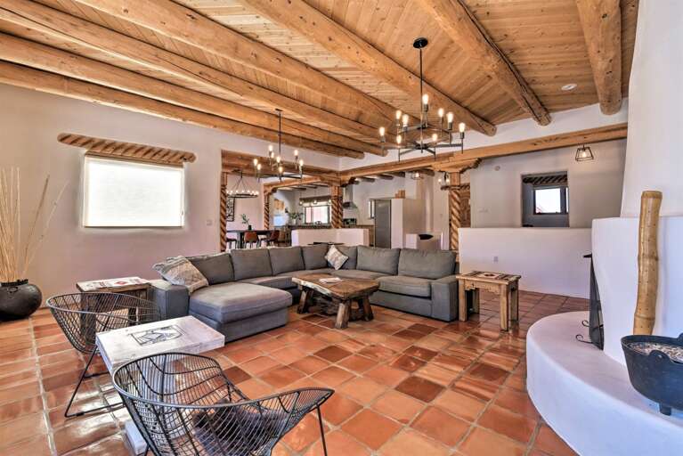 Beautiful Saltillo tile flooring flows throughout the interior.