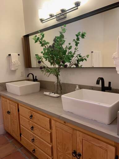 Effortlessly get ready at the double vanity each day.