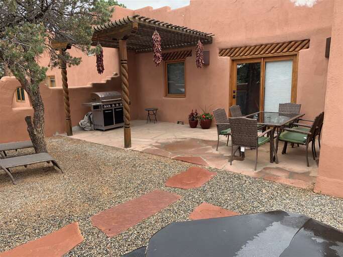 Patio with Grill and Dining Set.