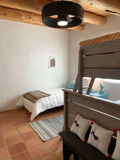 Your kiddos will love sharing the bunk room stocked with books.