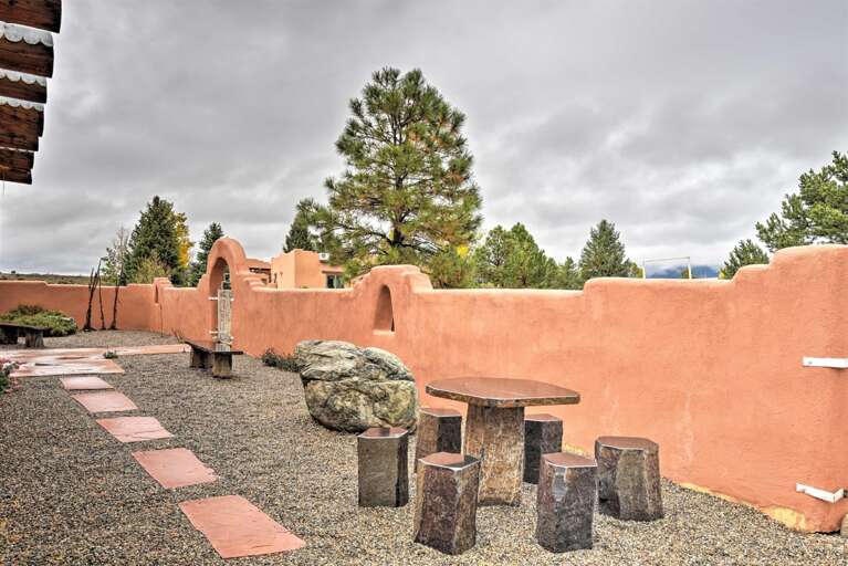 This private property offers an enclosed terrace with outdoor seating.