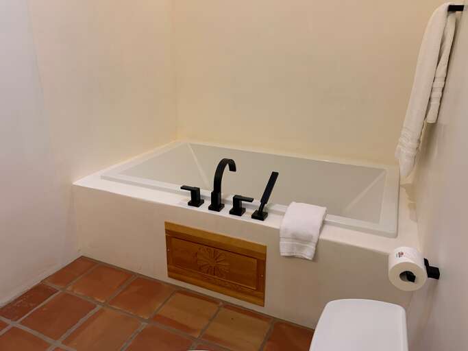 Melt your worries away in the inviting garden tub.