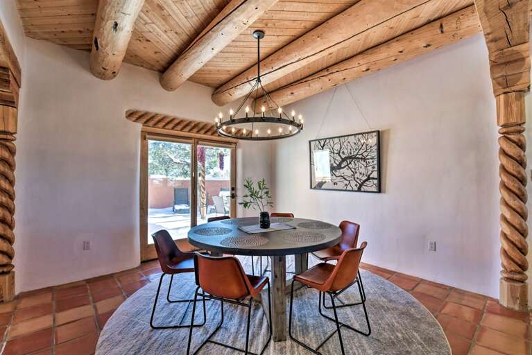 Share meals in style under the chic chandelier.