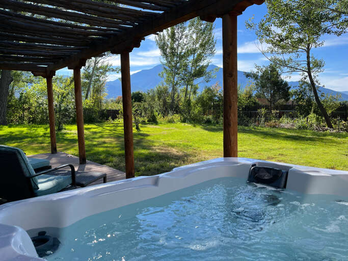 Beautiful spot to soak in the private back yard