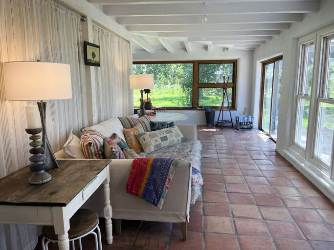 Sun Porch with exit to hot tub deck