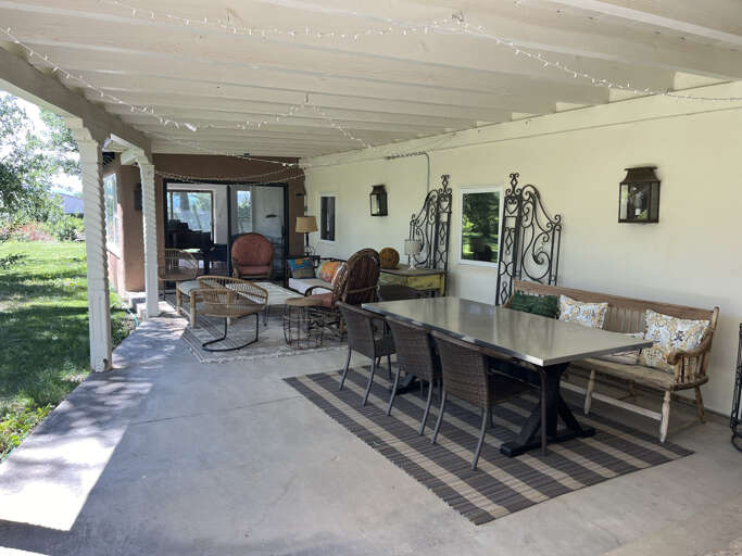 Outdoor dining area off the kitchen facing the lawn