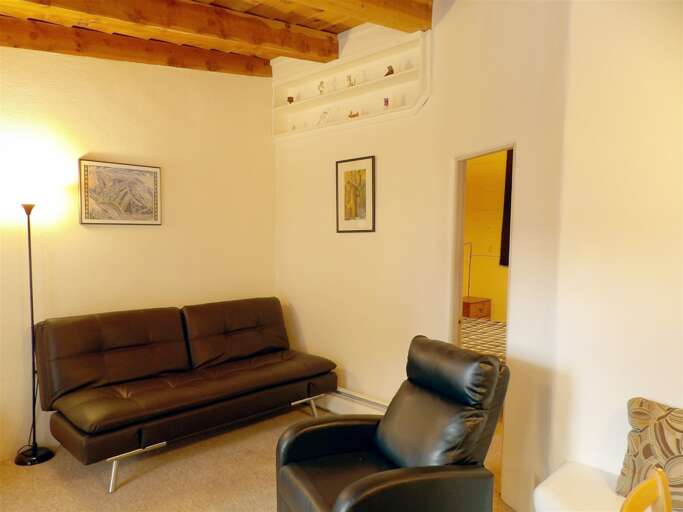 Living room entrance into main bedroom