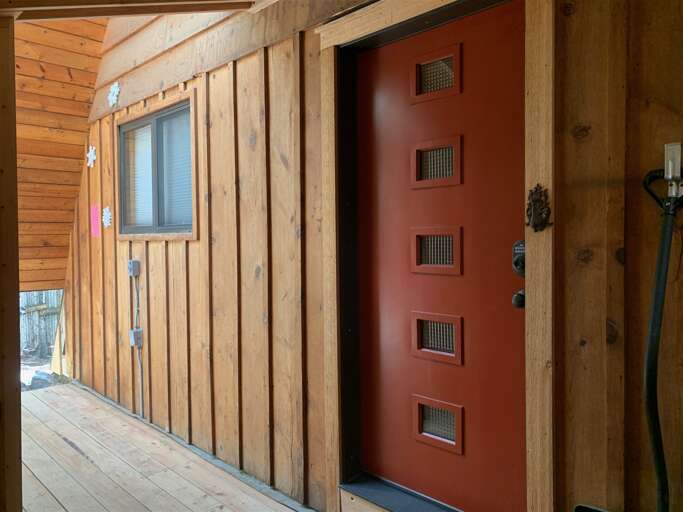 Living level home entry area near ski storage and Coyote Ln parking spots