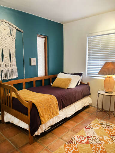 Guest wing twin bedroom with trundle twin beneath