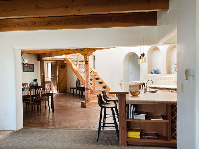 dining area and bar area between the kitchen and the dining area