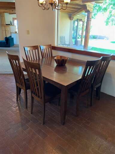 Dining table on brick floor