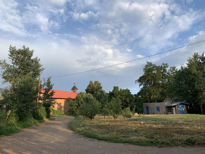 View from driveway of 200-year-old Adobe Holy Trinity Church, La Santisima Trinidad