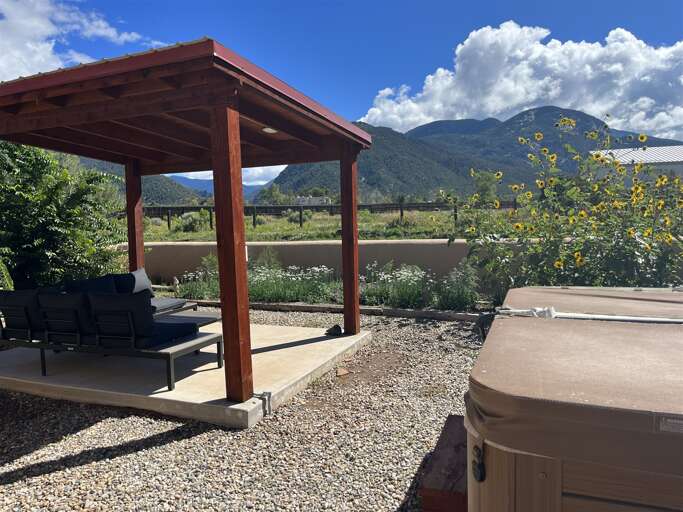 Gorgeous view from hot tub and private covered outdoor seating area