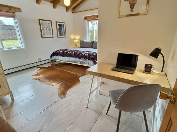 King bedroom with workspace