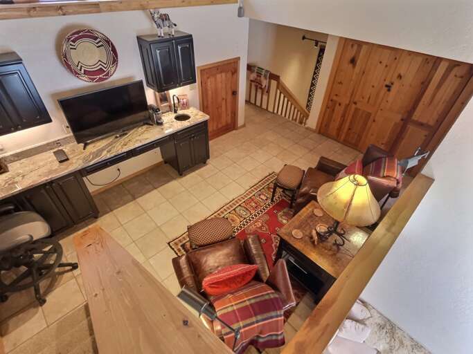 Wet Bar, Nespresso machine, and additional Smart TV in the second floor entertaining area