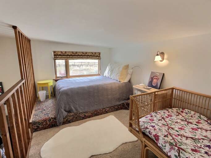 Upstairs loft with queen bed