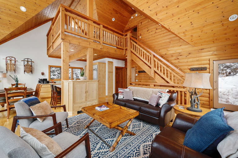 A loft and top story bedroom up the stairs